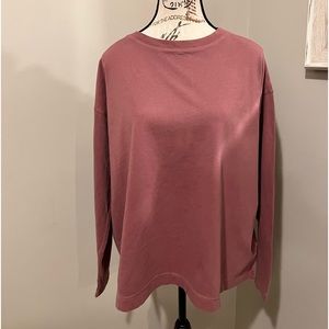 Rose colored long sleeve tee.